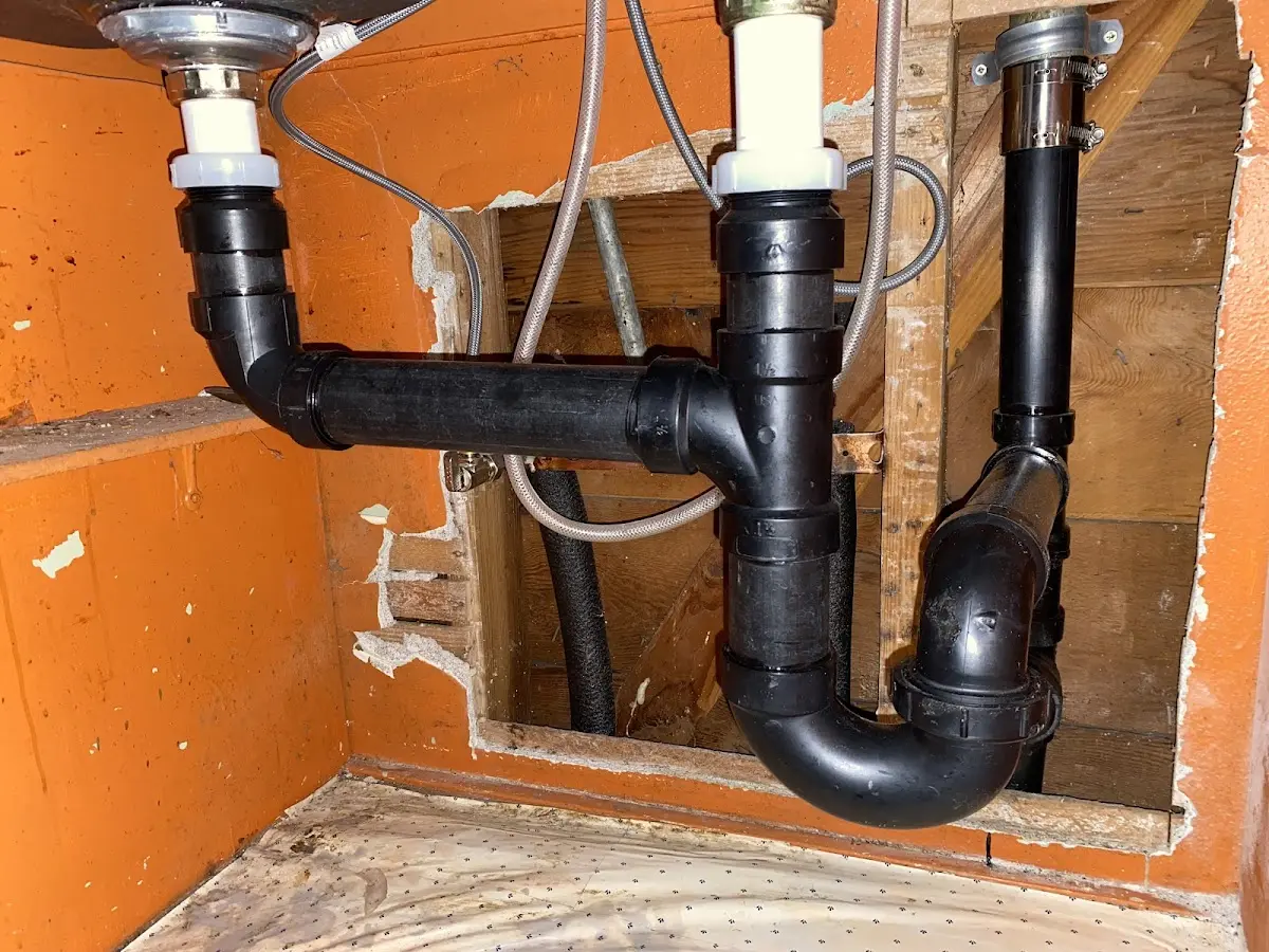 Professional Garbage Disposal Repair equipment and tools on the job in Topanga
